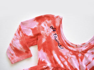 Valentine’s Day red tie dye twirly dress.  Je t’aime in chain stitching embroidered on back of neckline.