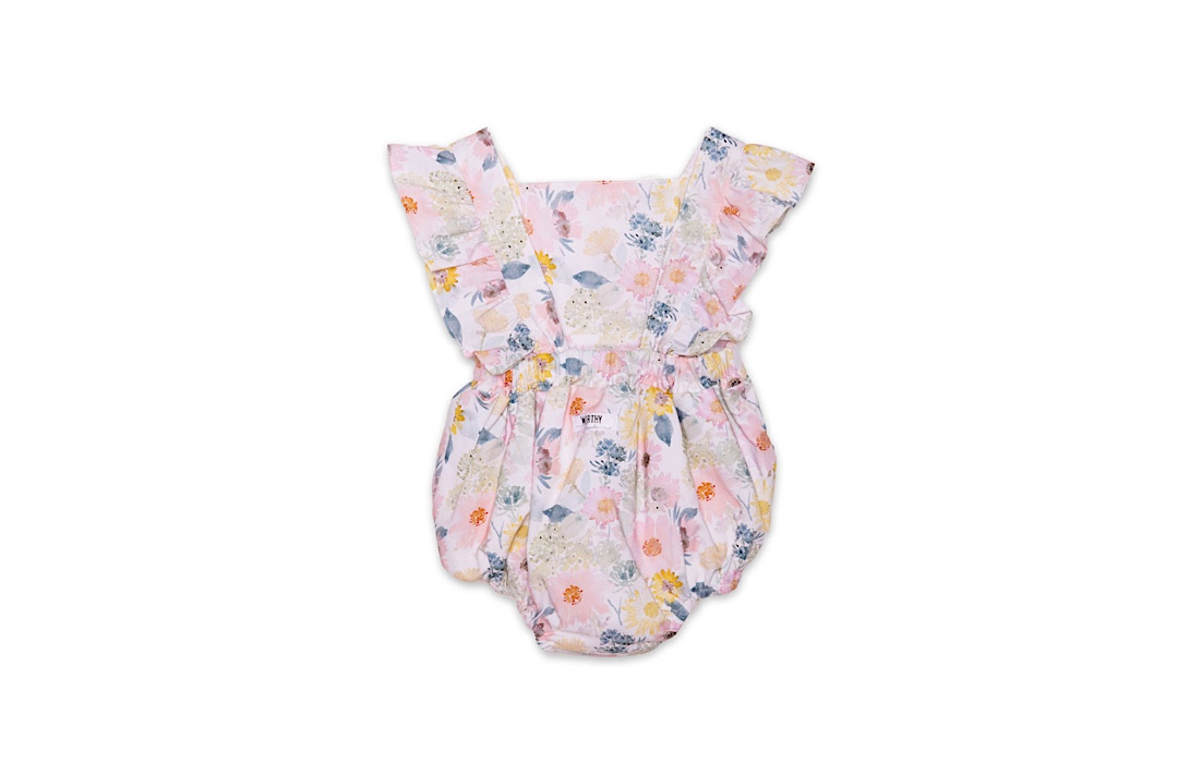 Baby bubble romper in pink flowery print, ruffle sleeves