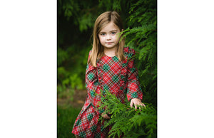 Toddler in christmas plaid holiday dress