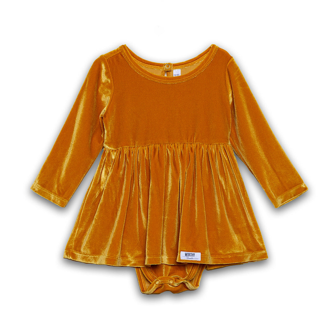 Baby bubble romper in stretch velvet mustard yellow gold