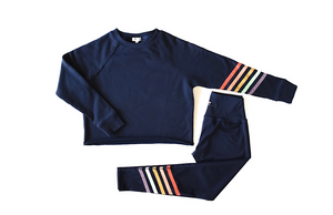 Matching adult activewear set in navy with rainbow stripes: cropped crew neck sweatshirt and leggings