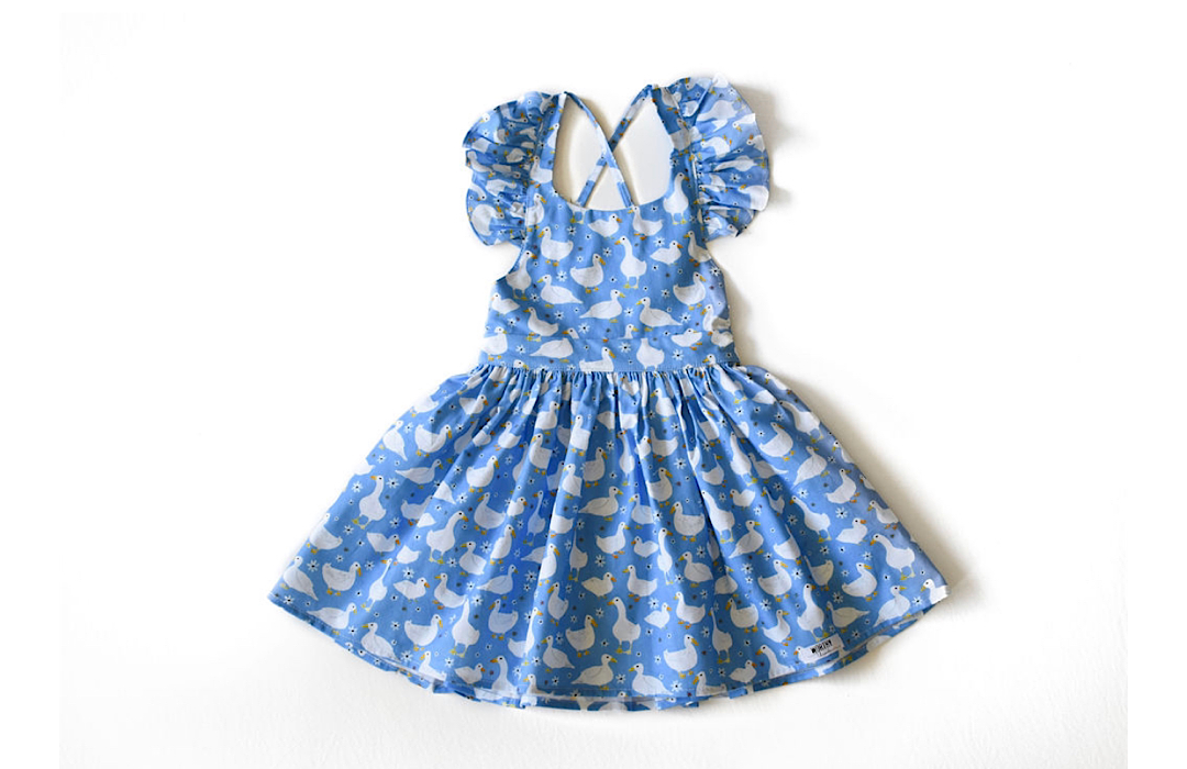 Ruffle sleeve dress in blue with ducks print